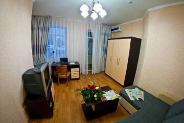 Фото номера Апартаменты с 1 спальней Апарт-отели Golden Dragon ApartHotel г. Бишкек 10