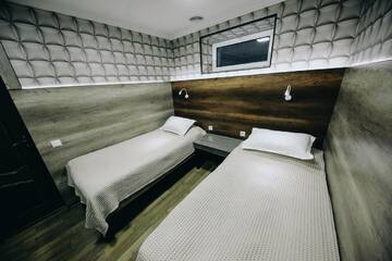 Фото номера Односпальная кровать в общем номере Отель Клубный Отель Флагман г. Бишкек 7