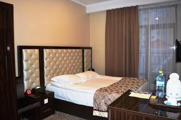 Фото номера Стандартный двухместный номер с 1 кроватью Отель Plaza Hotel Bishkek г. Бишкек 5