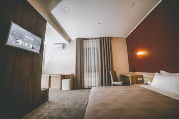 Фото номера Улучшенный одноместный номер Отель Lumarc Hotel г. Бишкек 6