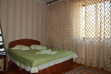Фото номера Стандартный двухместный номер с 1 кроватью Гостевой дом Lotos Guest House г. Бишкек 6