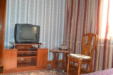 Фото номера Стандартный трехместный номер Гостевой дом Lotos Guest House г. Бишкек 7