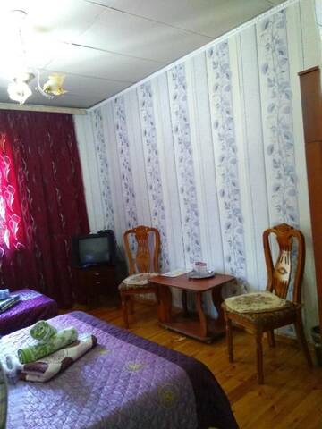 Фото номера Стандартный трехместный номер Гостевой дом Lotos Guest House г. Бишкек 9