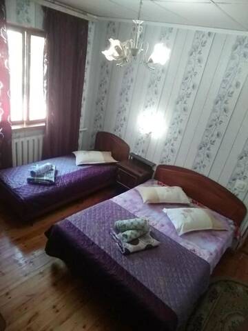 Фото номера Стандартный трехместный номер Гостевой дом Lotos Guest House г. Бишкек 11