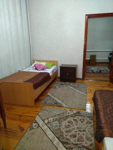 Фото номера Семейный номер с общей ванной комнатой Гостевой дом Lotos Guest House г. Бишкек 3
