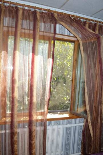 Фото номера Семейный номер с общей ванной комнатой Гостевой дом Lotos Guest House г. Бишкек 7