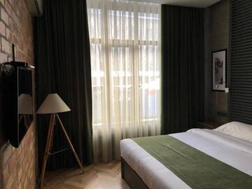 Фото номера Бюджетный одноместный номер Отель Bugu Hotel Bishkek г. Бишкек 2