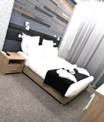 Фото Отели типа «постель и завтрак» Small Hotel г. Бишкек 5