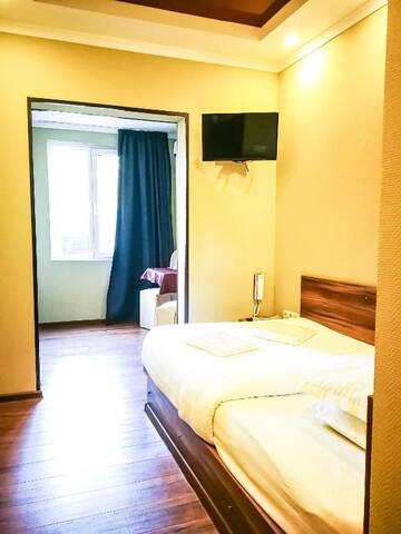 Фото номера Улучшенный одноместный номер Отель Salut Hotel г. Бишкек 13