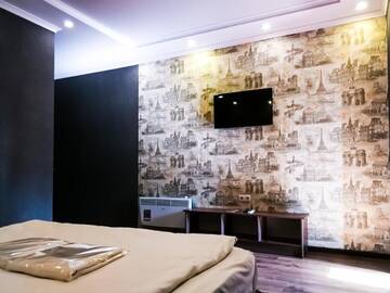 Фото номера Двухместный номер Делюкс с 1 кроватью Отель Salut Hotel г. Бишкек 7