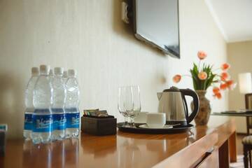 Фото номера Стандартный одноместный номер Отель Damas International Hotel г. Бишкек 2
