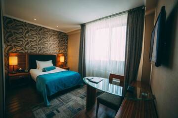 Фото номера Стандартный одноместный номер Отель Damas International Hotel г. Бишкек 3