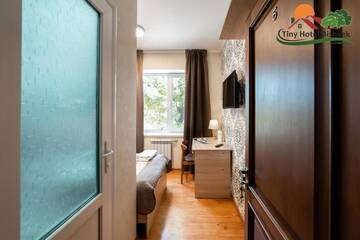 Фото номера Одноместный номер с ванной комнатой Гостевой дом Tiny Hotel Bishkek г. Бишкек 29