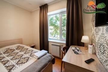 Фото номера Одноместный номер с ванной комнатой Гостевой дом Tiny Hotel Bishkek г. Бишкек 24