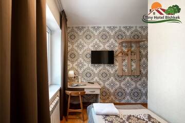 Фото номера Одноместный номер с ванной комнатой Гостевой дом Tiny Hotel Bishkek г. Бишкек 10