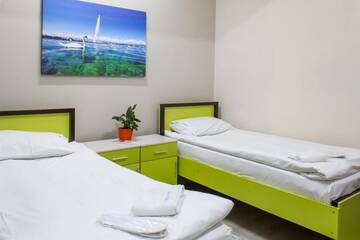 Фото номера Двухместный номер с 2 отдельными кроватями Хостелы Compass Hostel г. Бишкек 13