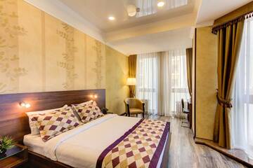 Фото номера Номер Делюкс (для 2 взрослых и 1 ребенка) Отель Bishkek Centrum Hotel г. Бишкек 6