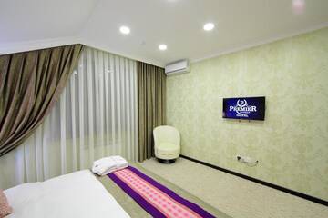 Фото номера Люкс с 2 спальнями Отель Premier Hotel г. Бишкек 3