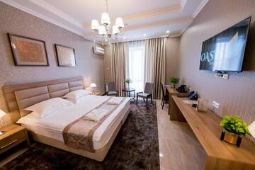 Фото номера Большой двухместный номер с 1 кроватью Отель Oasis Residence г. Бишкек 9