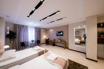 Фото номера Просторный двухместный номер с 2 отдельными кроватями Отель Oasis Residence г. Бишкек 5