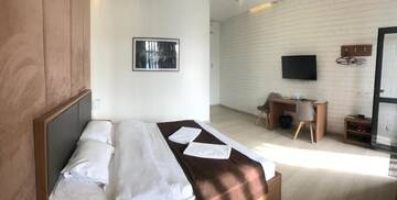Фото номера Номер с кроватью размера «king-size» Отель Concord Hotel г. Бишкек 15
