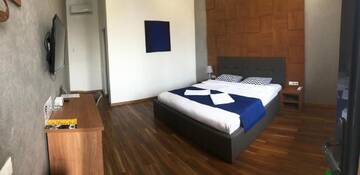 Фото номера Номер с кроватью размера «king-size» Отель Concord Hotel г. Бишкек 7