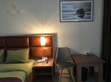 Фото номера Номер с кроватью размера «queen-size» Отель Concord Hotel г. Бишкек 8