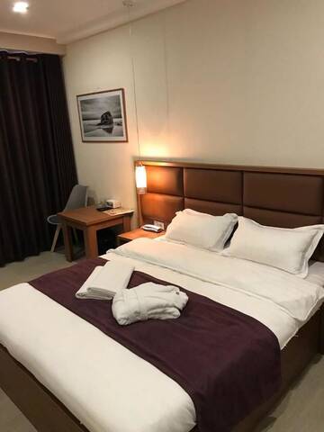 Фото номера Номер с кроватью размера «queen-size» Отель Concord Hotel г. Бишкек 4