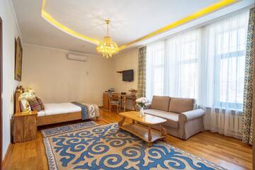 Фото номера Улучшенный двухместный номер с 1 кроватью Отель Navat Hotel г. Бишкек 6