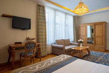 Фото номера Улучшенный двухместный номер с 1 кроватью Отель Navat Hotel г. Бишкек 8