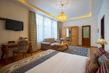 Фото номера Улучшенный двухместный номер с 1 кроватью Отель Navat Hotel г. Бишкек 10