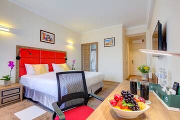 Фото номера Двухместный номер Делюкс с 1 кроватью Отель Garden Hotel &amp; SPA г. Бишкек 3