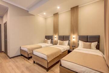 Фото номера Стандартный трехместный номер Отель Sara Boutique Hotel г. Бишкек 5