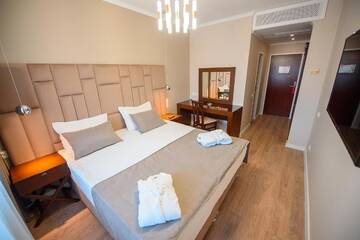 Фото номера Двухместный номер с 1 кроватью Отель Arulan Hotel г. Бишкек 5