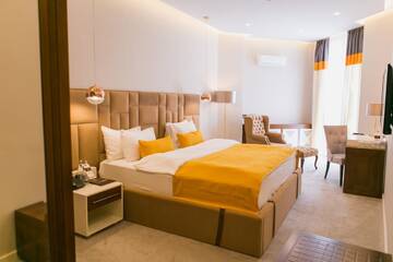 Фото номера Двухместный номер с 1 кроватью Отель Arulan Hotel г. Бишкек 4