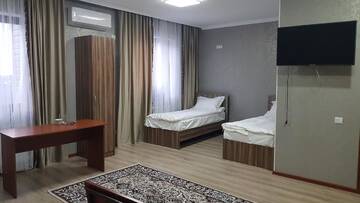 Фото номера Четырехместный номер Отель Nomad Hotel Bishkek Halal г. Бишкек 3